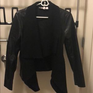 Black leather jacket with knit accent